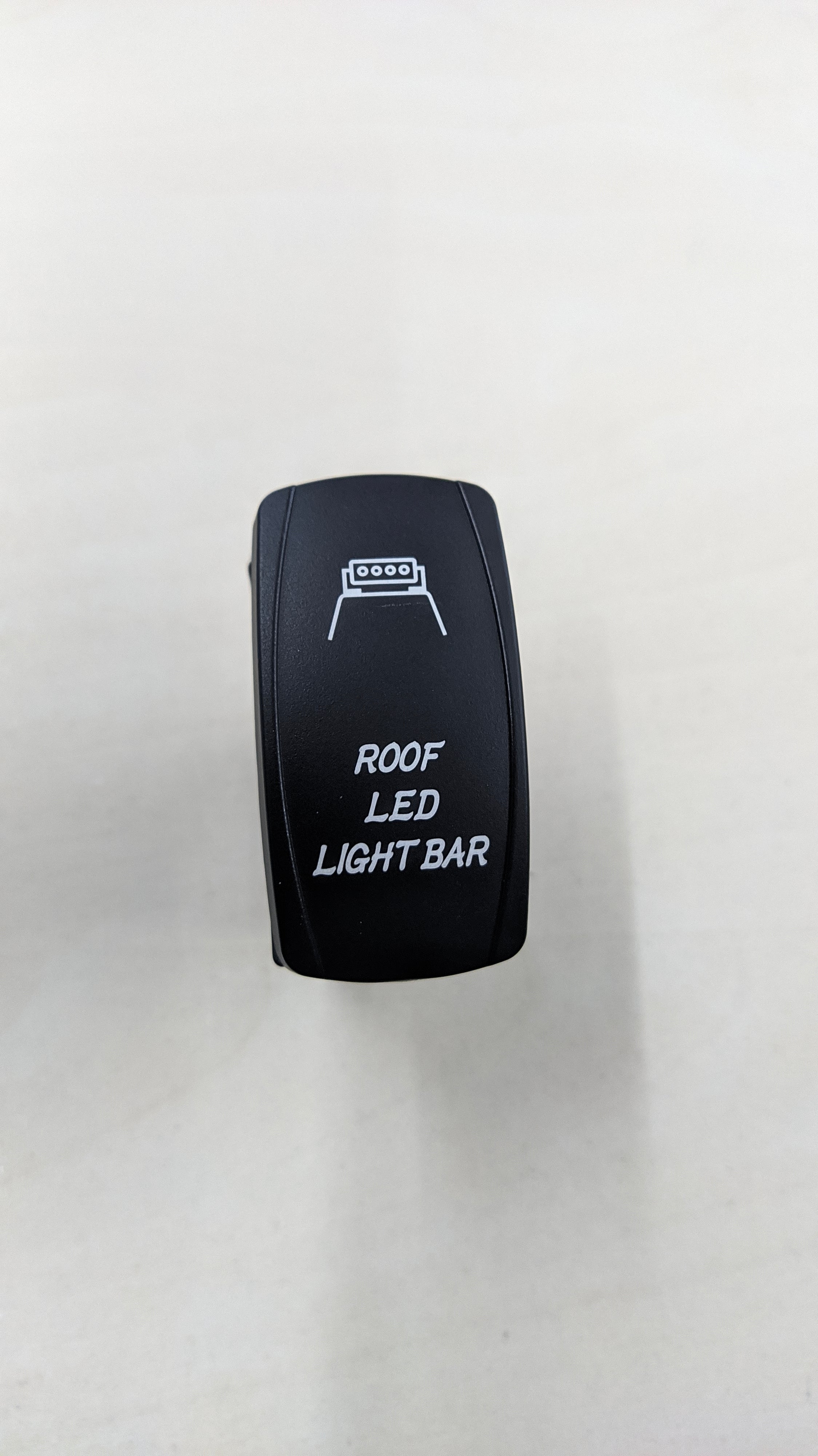 Jungiklis LED žibintams SU apšvietimu (rock switch)
